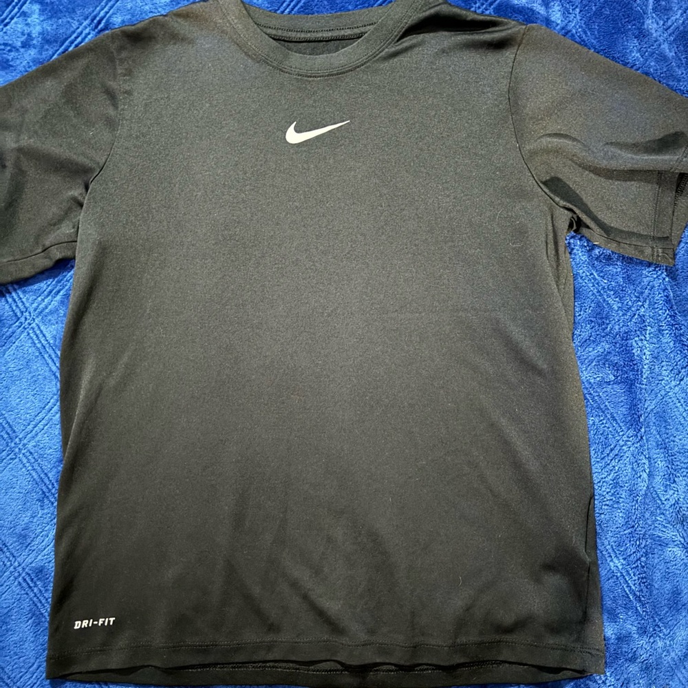 Unisex size M Nike black tee with white swoosh on it